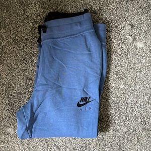 Nike joggers with drawstring and extra waste-band. Worn twice, too small.